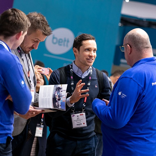 Event photography at Bett London featuring people in conversation
