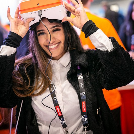 Event Photography capturing an attendee using a virtual headset at BETT.