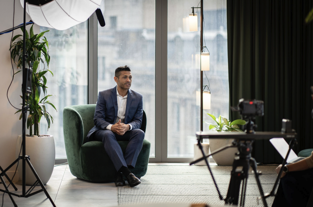 Executive being filmed for a corporate interview