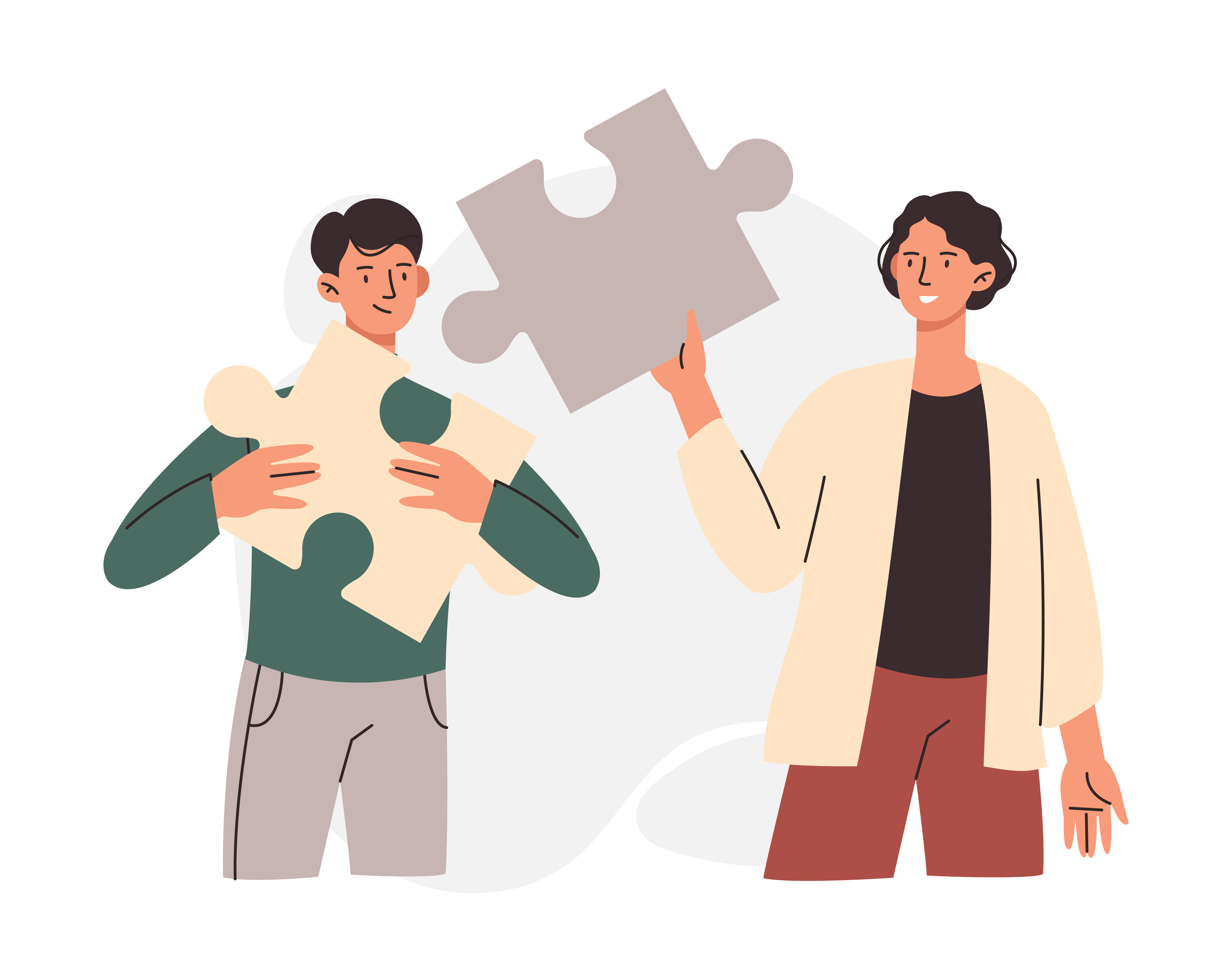 two people holding up puzzle pieces