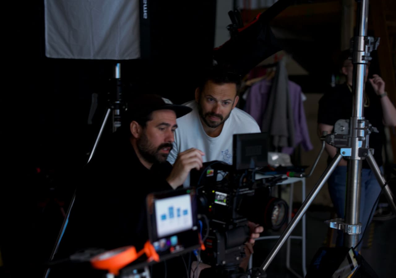 MHF Creative crew reviewing a monitor during a B2B corporate video production