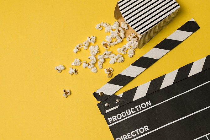 clapperboard and popcorn