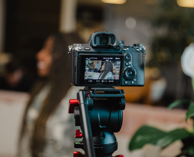 female side profile being filmed by video production agency