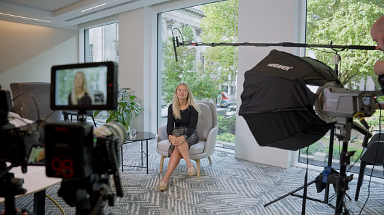 Behind-the-scenes at a recruitment video production agency filming a senior female leader at Evelyn Partners for a women in leadership campaign.