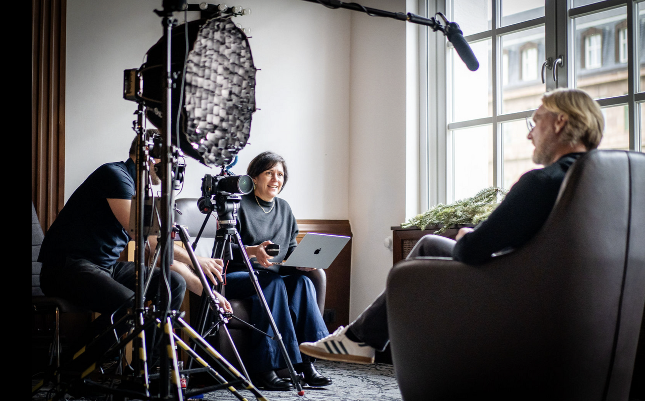 Professional video production setup filming a leadership interview with a senior executive.